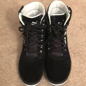 Black high top Puma sneakers